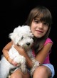 Girl and her white dog